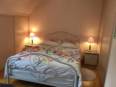 Un ou plusieurs lits dans un hébergement de l'établissement Chambres d'hotes Chez Annie