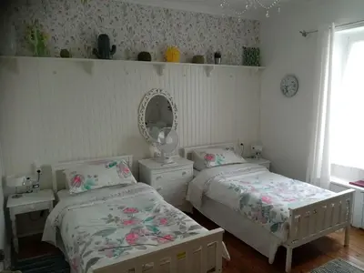 Un ou plusieurs lits dans un hébergement de l'établissement Maison Jonela