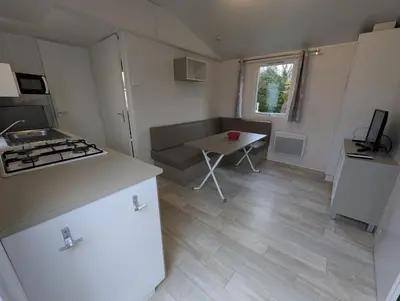 Cuisine ou kitchenette dans l'établissement Camping de Lanven