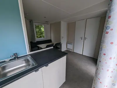 Cuisine ou kitchenette dans l'établissement Camping de Lanven
