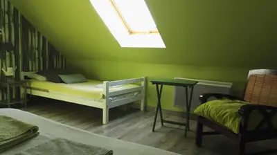 Un ou plusieurs lits dans un hébergement de l'établissement Maison Ti ar raniged