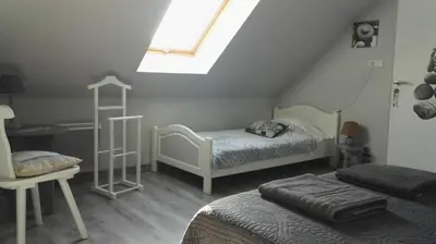 Un ou plusieurs lits dans un hébergement de l'établissement Maison Ti ar raniged