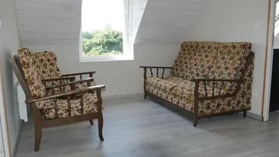 Coin salon dans l'établissement La ferme Guibel