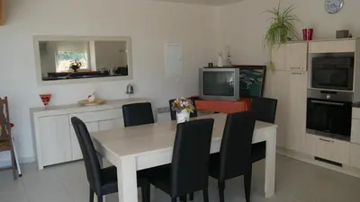 Cuisine ou kitchenette dans l'établissement La ferme Guibel
