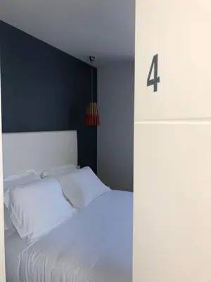 Un ou plusieurs lits dans un hébergement de l'établissement Roscoff Beach House