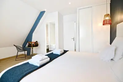 Un ou plusieurs lits dans un hébergement de l'établissement Roscoff Beach House