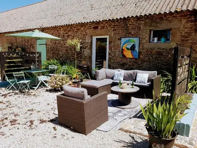 Coin salon dans l'établissement L'Effraie des Clochers