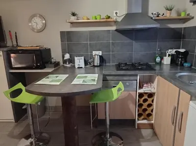 Cuisine ou kitchenette dans l'établissement Appartement plein pied bord de mer