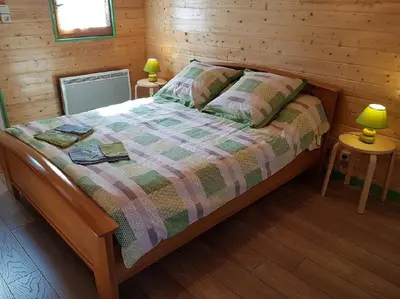 Un ou plusieurs lits dans un hébergement de l'établissement Bungalow de Kermoal