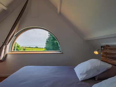 Un ou plusieurs lits dans un hébergement de l'établissement Chalet L'Atelier by Interhome