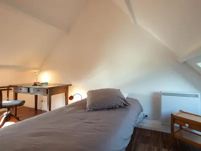 Un ou plusieurs lits dans un hébergement de l'établissement Chalet L'Atelier by Interhome