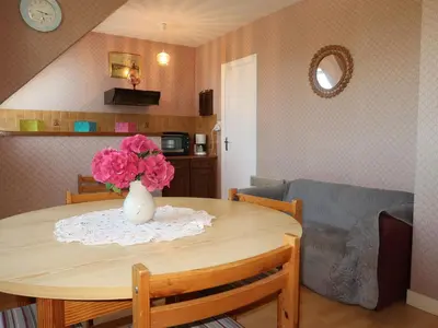 Coin salon dans l'établissement Apartment Ty Ménez by Interhome
