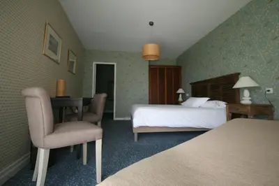 Un ou plusieurs lits dans un hébergement de l'établissement Auberge du Cabestan Hotel Audierne