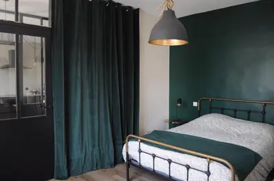 Un ou plusieurs lits dans un hébergement de l'établissement BENODET - Maison plage à pied - 4 chambres