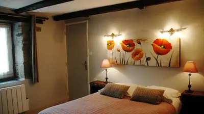 Un ou plusieurs lits dans un hébergement de l'établissement Chambres d'Hotes Belard