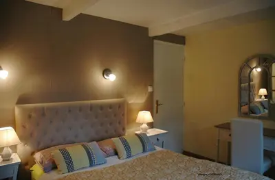 Un ou plusieurs lits dans un hébergement de l'établissement Chambres d'Hotes Belard