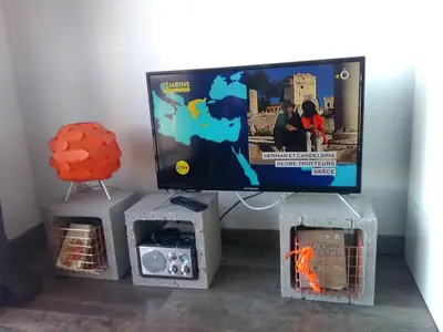 Télévision ou salle de divertissement dans l'établissement Grand Studio Vue Mer