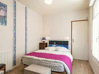 Un ou plusieurs lits dans un hébergement de l'établissement Holiday Home Kereol by Interhome