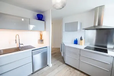 Cuisine ou kitchenette dans l'établissement L' Évéa Rooftop