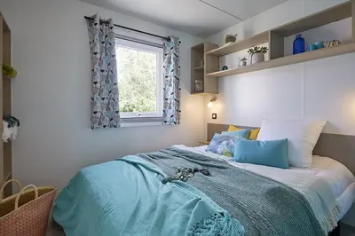 Un ou plusieurs lits dans un hébergement de l'établissement Camping de la Baie de Térénez