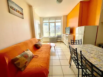 Coin salon dans l'établissement Résidence Des Bains