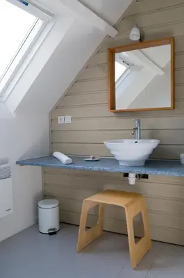 Salle de bains dans l'établissement Le Château de Sable