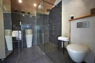 Salle de bains dans l'établissement Les Galets Blancs