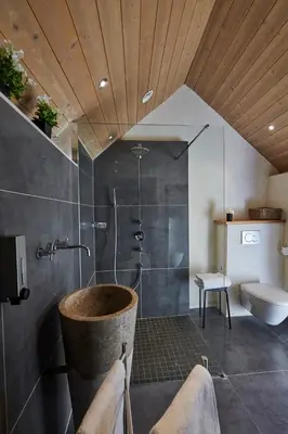 Salle de bains dans l'établissement Les Galets Blancs