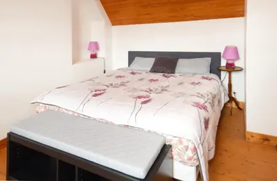Un ou plusieurs lits dans un hébergement de l'établissement La Maison aux Volets Bleus de Prat An Ilis à 900m de la plage du Guilvinec