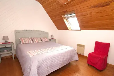 Un ou plusieurs lits dans un hébergement de l'établissement La Maison aux Volets Bleus de Prat An Ilis à 900m de la plage du Guilvinec