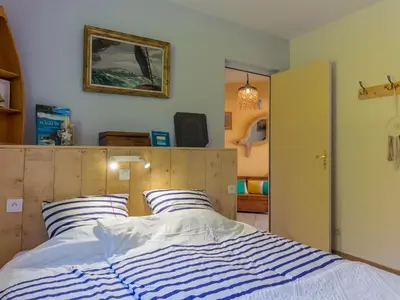 Un ou plusieurs lits dans un hébergement de l'établissement Holiday Home Villa Panorama Mer by Interhome