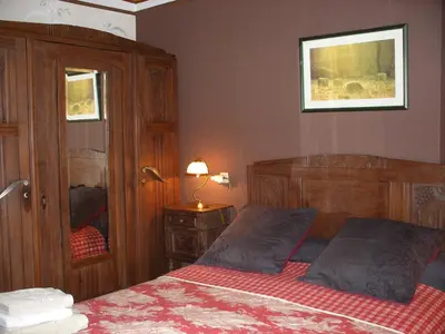 Un ou plusieurs lits dans un hébergement de l'établissement Les chambres d'hotes du cosquer