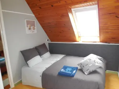 Un ou plusieurs lits dans un hébergement de l'établissement Chambre d'hôtes proche de Brest et Landerneau