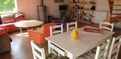 Coin salon dans l'établissement LE PETIT COIN DE PARADIS