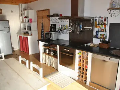 Cuisine ou kitchenette dans l'établissement LE PETIT COIN DE PARADIS