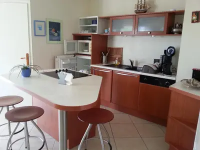 Cuisine ou kitchenette dans l'établissement Charme et Océan face à la plage
