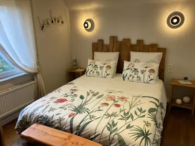 Un ou plusieurs lits dans un hébergement de l'établissement Les Chambres de Kermenguy