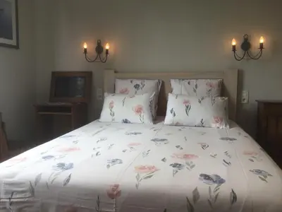 Un ou plusieurs lits dans un hébergement de l'établissement Les Chambres de Kermenguy