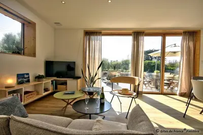 Télévision ou salle de divertissement dans l'établissement Gîte Les Roseaux