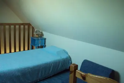 Un ou plusieurs lits dans un hébergement de l'établissement Gîtes du Ménez-Hom