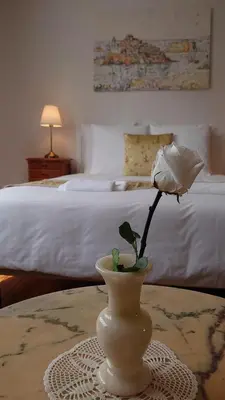 Un ou plusieurs lits dans un hébergement de l'établissement La Maison Serrurier - Chambres d’hôtes