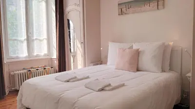 Un ou plusieurs lits dans un hébergement de l'établissement La Maison Serrurier - Chambres d’hôtes