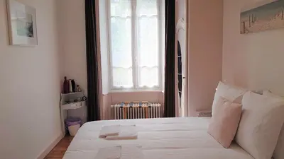 Un ou plusieurs lits dans un hébergement de l'établissement La Maison Serrurier - Chambres d’hôtes