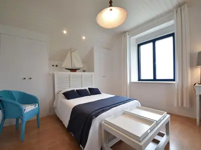 Un ou plusieurs lits dans un hébergement de l'établissement Beautiful holiday home by the sea in Penmarch