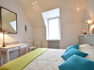 Un ou plusieurs lits dans un hébergement de l'établissement Beautiful holiday home by the sea in Penmarch