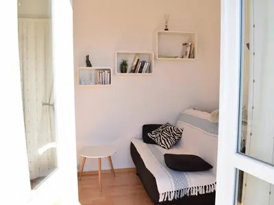 Un ou plusieurs lits dans un hébergement de l'établissement Lumineux appartement 2 pers, centre Trébeurden, proche plage, chiens admis - FR-1-368-136