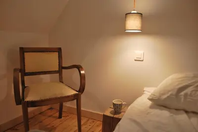 Un ou plusieurs lits dans un hébergement de l'établissement Maison de village, charme scandinave