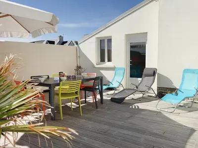 Coin salon dans l'établissement Holiday Home Sables Blancs by Interhome