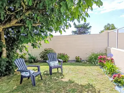 Jardin de l'établissement Holiday Home Sables Blancs by Interhome