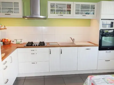 Cuisine ou kitchenette dans l'établissement Holiday Home Sables Blancs by Interhome